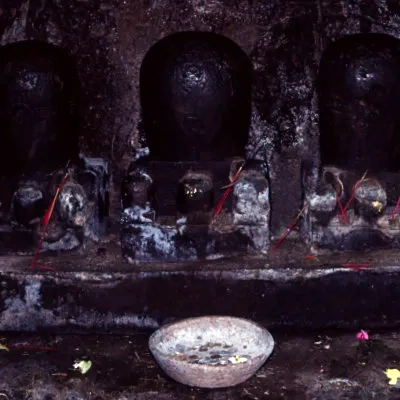 Linga (phallic symbols) in the cave, Goa Gajah