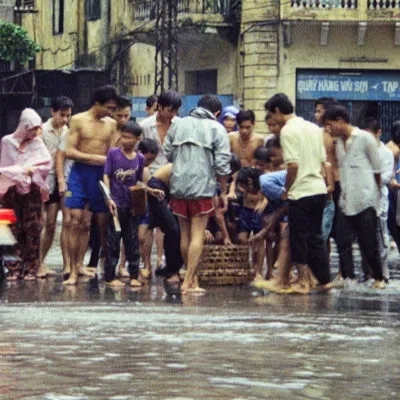 Catching fish in the street, Ho Chi Minh City